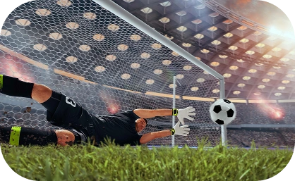 Intense goalkeeping action moment with a football heading toward the net inside a professional stadium atmosphere.